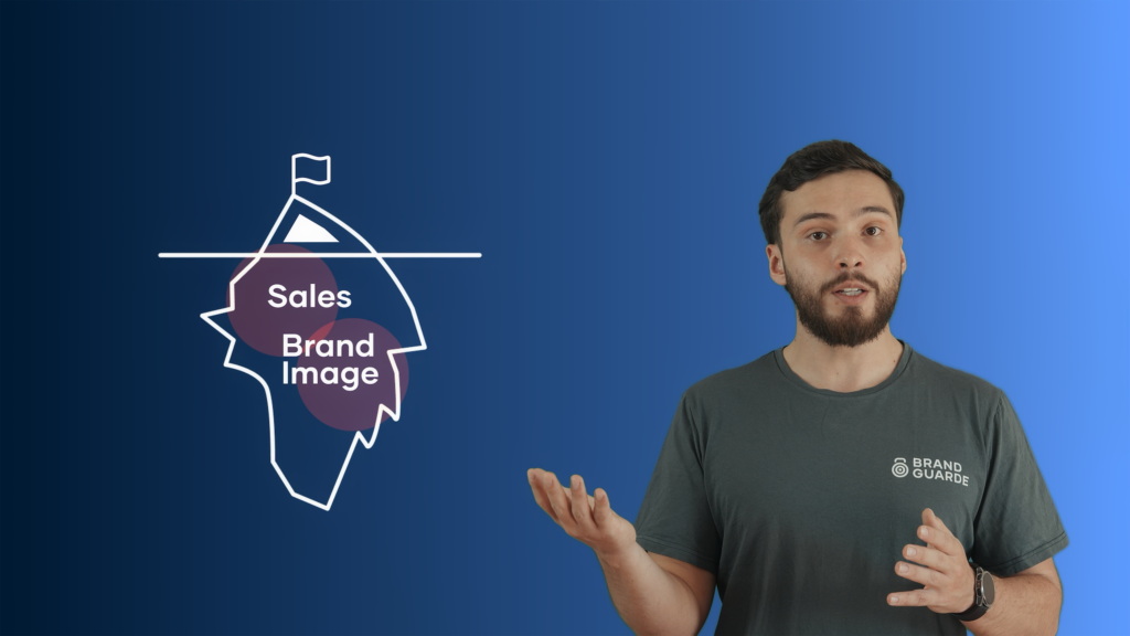 A man stands next to an iceberg diagram labeled "Sales" above water and "Brand Image" below, on a blue gradient background, illustrating Embodic Films’ approach to uncovering the deeper layers of brand storytelling.